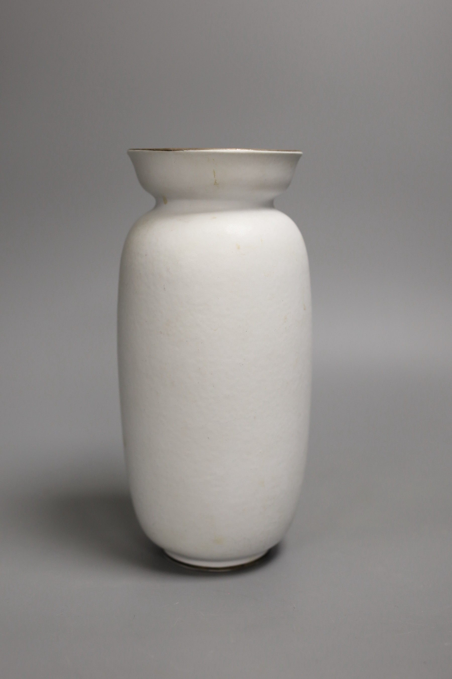 A Gustavsberg Stig Lindberg 215 shape Grazia vase decorated with a woman, vase and flowers, 20cm